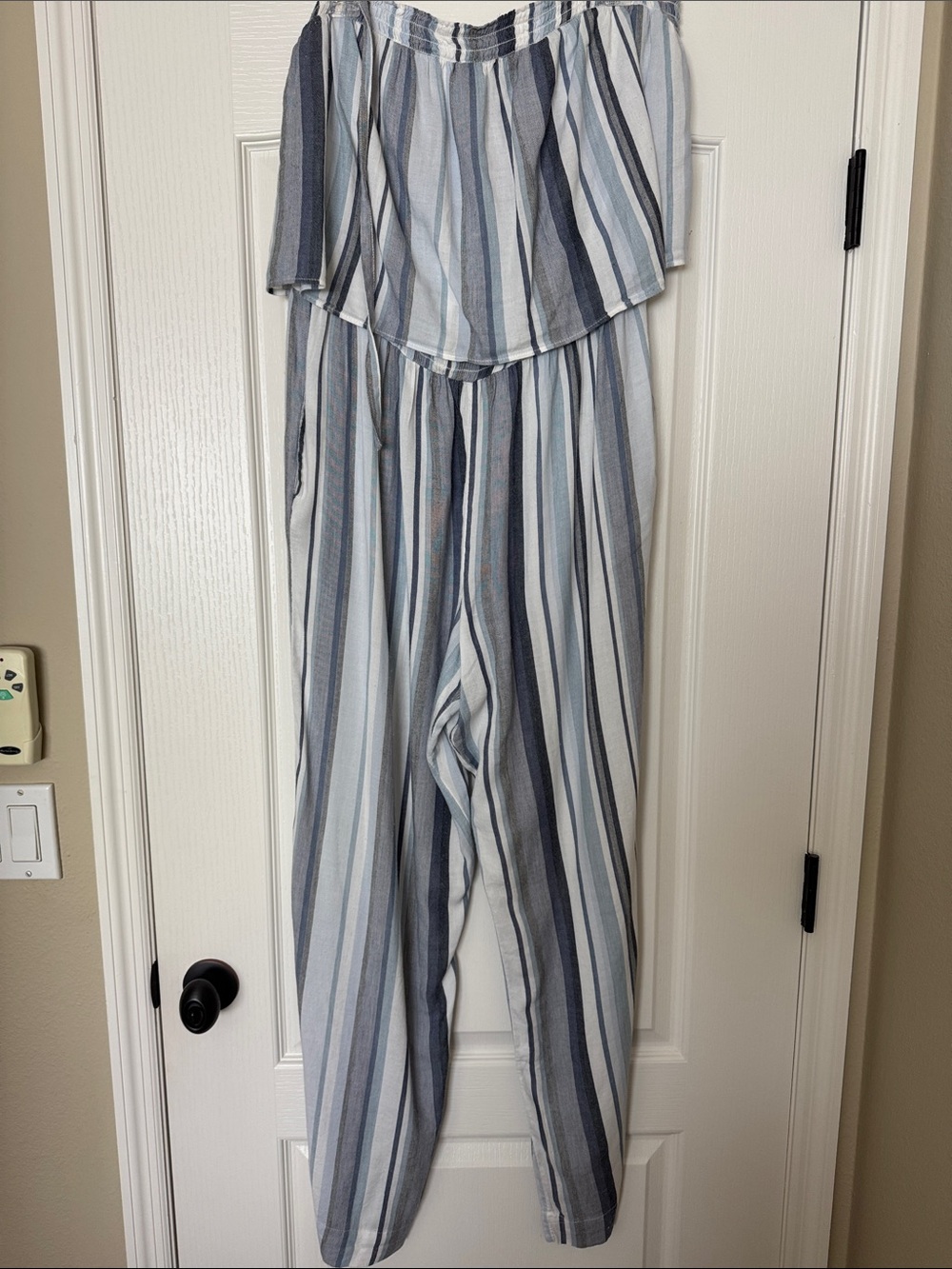 Striped Blue & White Jumpsuit. Bow-tied straps. Elastic waist, side pockets.